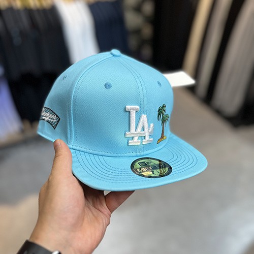 کلاه کپ فیت بک نیو ارا (NEW ERA LA) آبی روشن سایز (1/4)7 (57.7 CM)